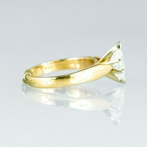(I-357-546) 14k gold Marquise cut diamond solitaire ring