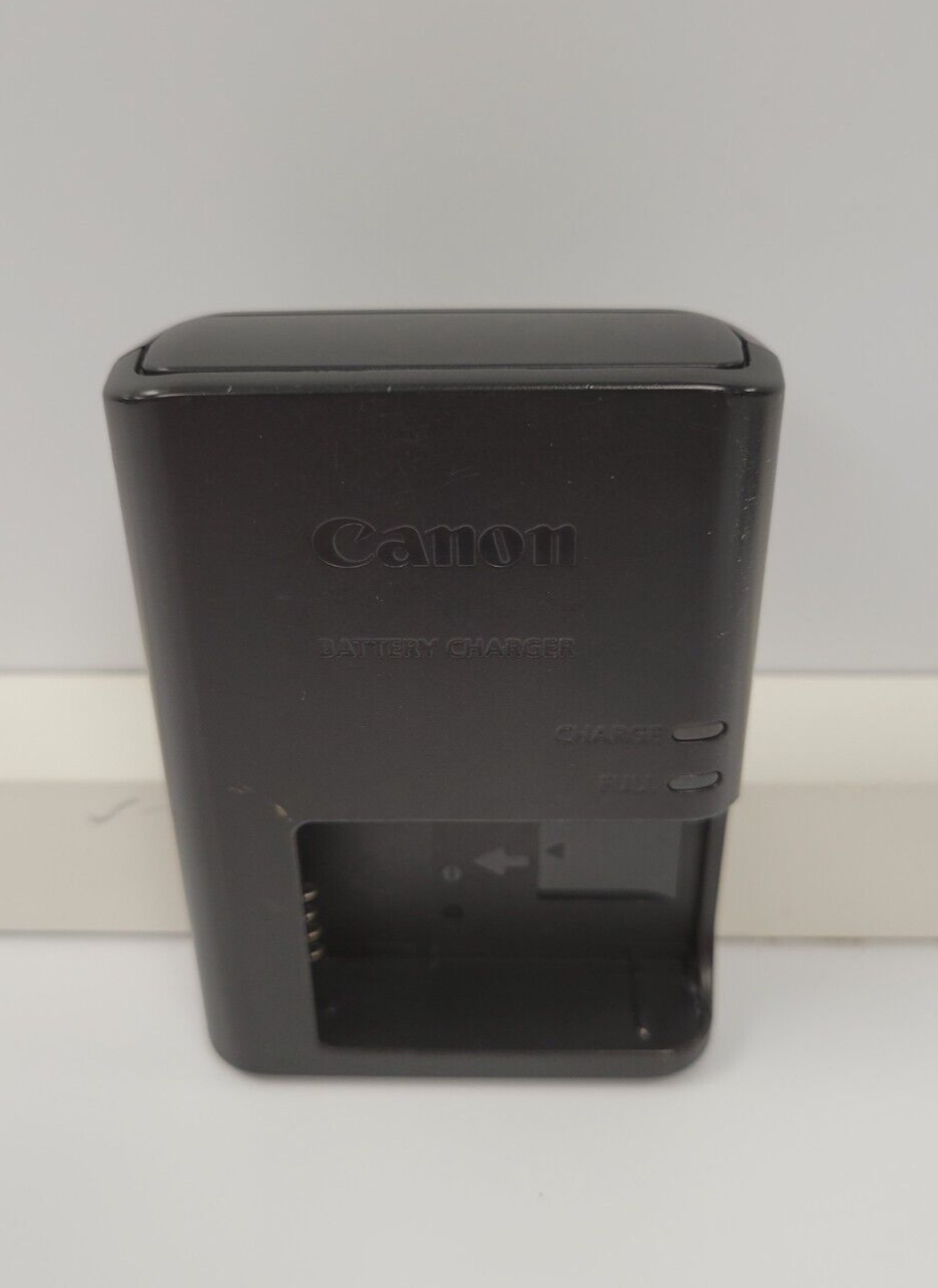 (I-36198) Canon LS-E12 Battery Charger and Batteries